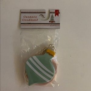 2 unopened ceramic ornaments